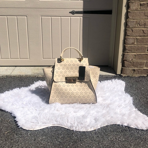 Zac Posen Handbags - NWT Zac Posen Feminine Lasercut Eartha Floral Ivory Purse